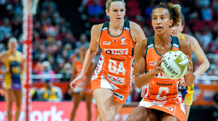 Serena Guthrie of the Giants (centre) looks to pass the ball during the Super Netball Preliminary Final between Giants Netball and the Sunshine Coast Lightning at Qudos Bank Arena in Sydney, Sunday, August 19, 2018. 