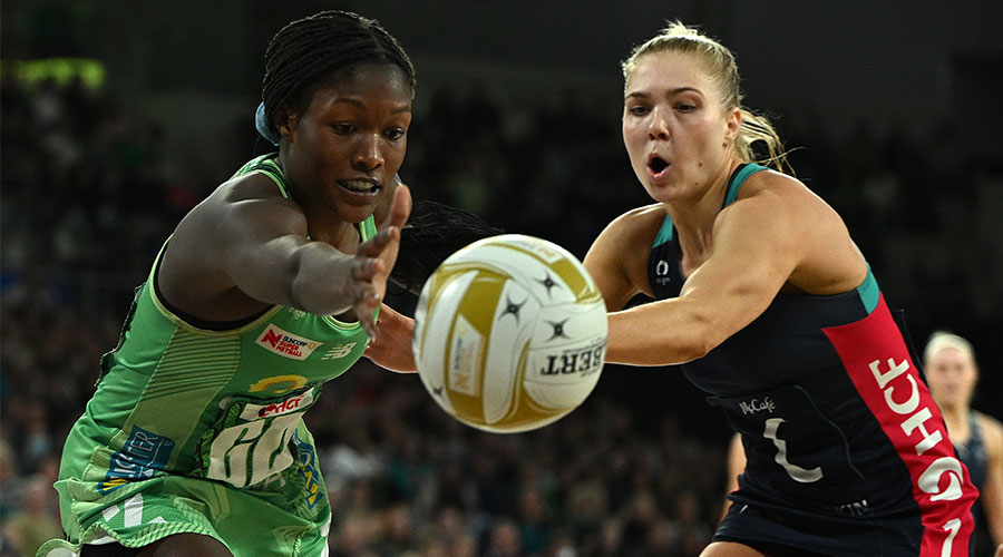 Sunday Aryang of the Fever and Kate Moloney of the Vixens during the Super Netball Major Semi Final match between the Melbourne Vixens and the West Coast Fever at John Cain Arena in Melbourne, Saturday, June 18, 2022.