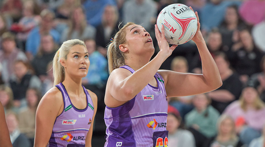 Donnell Wallam of the Queensland Firebirds shoots for goal during the round nine Super Netball match between Collingwood Magpies and Queensland Firebirds at MyState Bank Arena, on May 15, 2022, in Hobart, Australia.