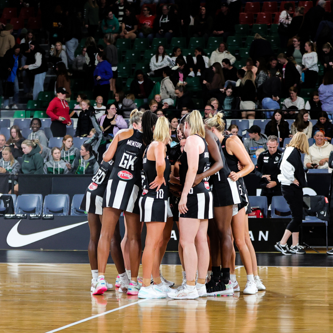 Collingwood gathers in a huddle before their pre-season match against the Firebirds