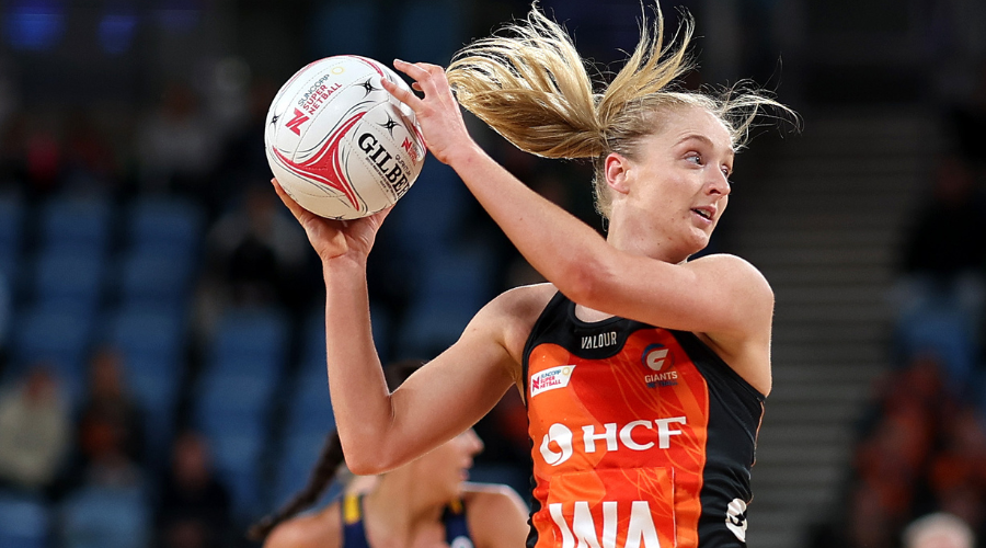 Maddie Hay moves the ball forwards for the GIANTS.