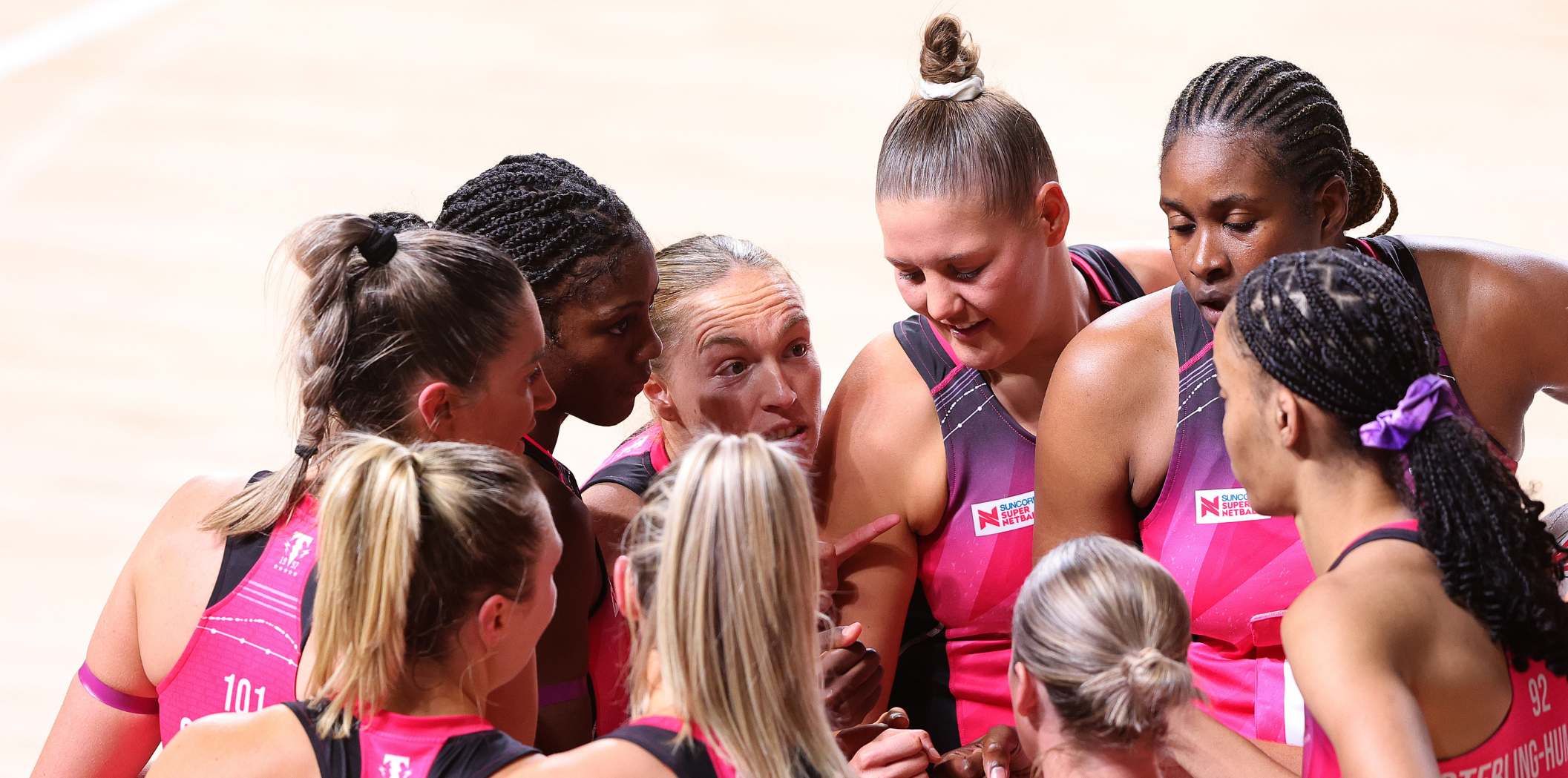 The Adelaide Thunderbirds gather at a timeout.